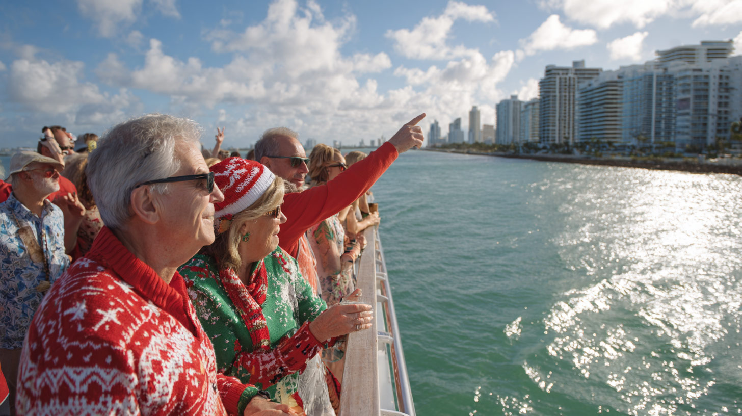 All the passengers are dressed up in Christmas themes during the cruise. 